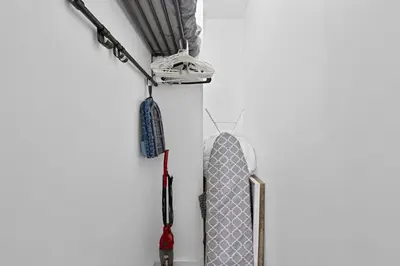 a scooter hanging on a wall in a room at Sunny Miami Beach Retreat in Miami Beach