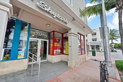 a bike parked in front of a store at Sunny Miami Beach Retreat in Miami Beach