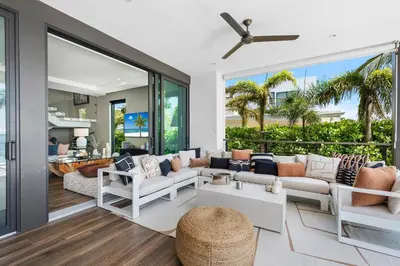 a living room with a couch and chairs at Best Bayfront View New construction w pool in Miami Beach