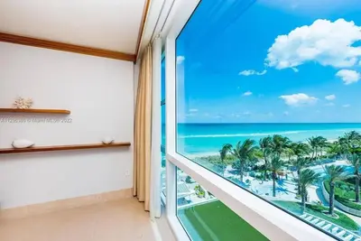 a room with a view of the ocean at Ocean View Luxury Carillon Condo at Beach Access C616 in Miami Beach