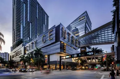 a building on a city street with buildings at NEW PRIVATE STUDIO MAGIC CITY OF MIAMI, GATED PARKING in Miami