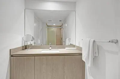 a bathroom with a sink and a mirror at Chic 2BDR 2BA Water Front in Hyde Beach in Hollywood