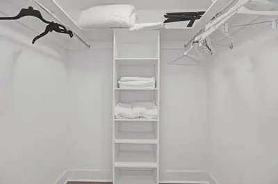 a room with a closet with white shelves at Chic 2BDR 2BA Water Front in Hyde Beach in Hollywood