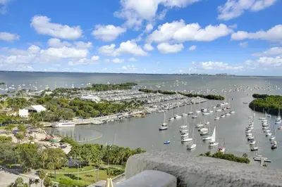 a marina with many boats in the water at Beautiful Blue & Gold Studio With Ocean View in Miami
