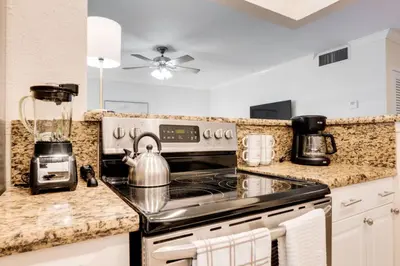 a kitchen with a stove and a blender at Intracoastal Oasis in a Prime Area w Pool and BBQ in Fort Lauderdale