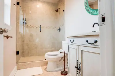 a bathroom with a toilet and a shower at Intracoastal Oasis in a Prime Area w Pool and BBQ in Fort Lauderdale