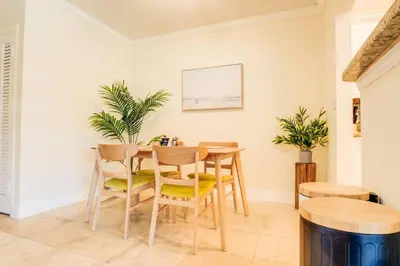 a dining room with a table and chairs at Intracoastal Oasis in a Prime Area w Pool and BBQ in Fort Lauderdale
