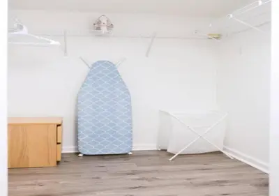 a blue tie in a room with a wooden floor at Stunning 1/1 Condo @Brickell Free Parking/Pool in Miami