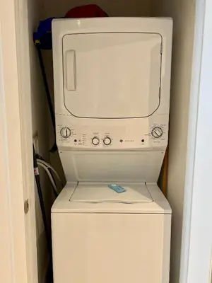 a computer on top of a washer and dryer at Direct Oceanfront Condo - Hyde Resort in Hollywood