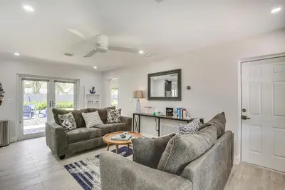 a living room with two couches and a table at Fort Lauderdale Vacation Rental about 8 Mi to Beaches! in Fort Lauderdale