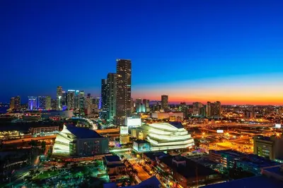 a view of a city at night at Comfy & Updated Apartment centrally located minutes away from everything! in Miami