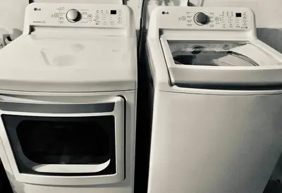 two white ovens next to each other in a kitchen at Pool House in Tropical Miami in Miami