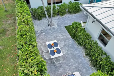 an overhead view of a table and chairs in a garden at Soleil @ Casa Del Sol in Fort Lauderdale