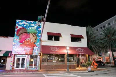 a building with a large mural on the side of it at Pleasing Little Havana Apt Fast WiFi Hv1 in Miami