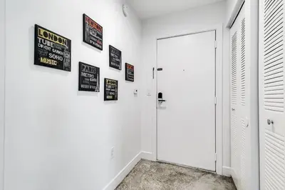 a white room with signs on the wall at Spectacular 2-Br Apartment 4 people 1107 in Miami