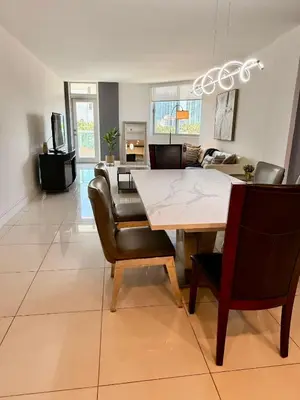 a dining room with a table and chairs at SPECIAL Beautiful Modern Beach Condo in Miami Beach