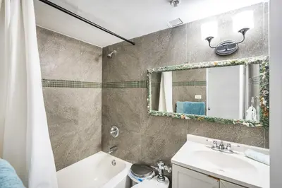 a bathroom with a sink and a mirror at LUXURY APARTMENT - Direct Bay in South Beach in Miami Beach