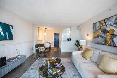 a living room with a couch and a table at LUXURY APARTMENT - Direct Bay in South Beach in Miami Beach