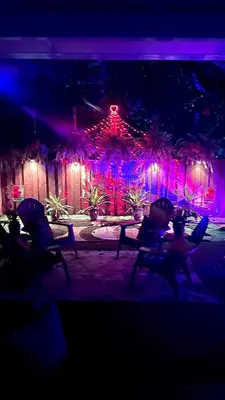a room with purple and pink lights on a building at The Boutique Guest House in Miami
