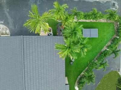 an overhead view of a house with palm trees at VillaKoBo Heated Pool Spa Bar Tennis Golf in Miami