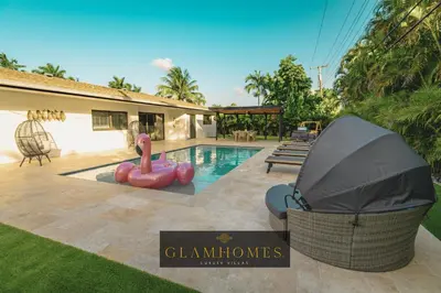 a villa with a swimming pool with an inflatableermott at Amazing Villa at Highland Lakes Boulevard BY THE GLAMHOMES in Miami