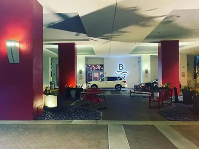 a car parked in a parking lot in a building at Trendy Beachfront Flat, Sea Views, Style & Amenities -A in Hallandale Beach
