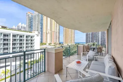 a balcony with a view of the city at King David By The Ocean in Miami Beach