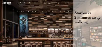 a restaurant with a bar with stools minutes away walking at BEACH VIBES in Miami Beach