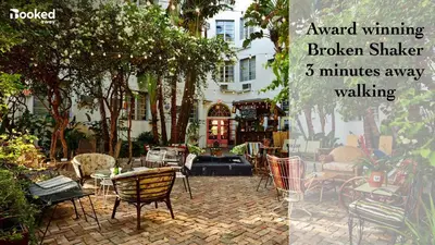 a picture of a patio with chairs and tables at BEACH VIBES in Miami Beach