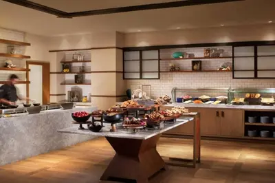 a kitchen with a table with food on it at Stunning Studio Apartment Located at the Ritz Carlton-Key Biscayne in Miami
