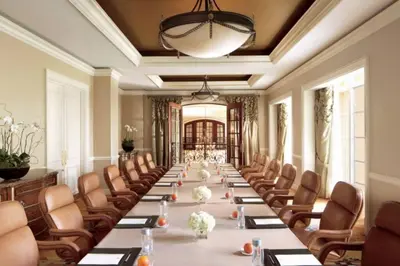 a long boardroom with a long table and chairs at Stunning Studio Apartment Located at the Ritz Carlton-Key Biscayne in Miami