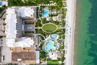 an overhead view of a resort with two pools at Lovely Deluxe Unit Located at Ritz Carlton - Key Biscayne! in Miami