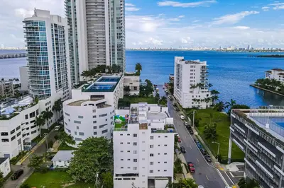 an aerial view of a city with buildings and the water at Subtle 2 Bed in Edgewater near Downtown With Free Parking in Miami