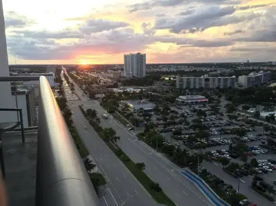 a view of a city with a highway and buildings at Contemporary Beach Retreat, Sleek Design & Full Kitchen -A in Hallandale Beach