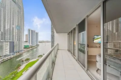 a balcony with a view of a river at Luxurious Ocean View Unit Brickell W residences in Miami