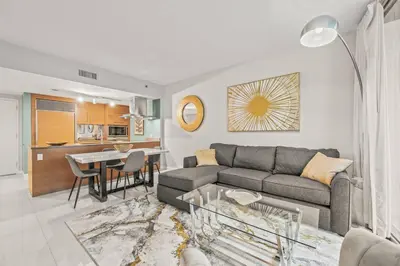 a living room with a couch and a table at Luxurious Ocean View Unit Brickell W residences in Miami