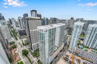 an aerial view of a city with tall buildings at Highest floor Icon W Brickell Location in Miami