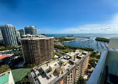 an aerial view of a city with buildings and a harbor at Balcony Ocean View ! WiFi - Pool - Gym - Parking in Miami