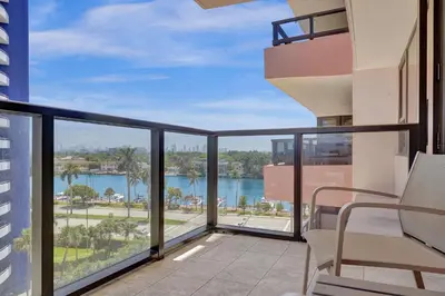 a balcony with a view of the water at Luxury Beachfront Ocean View Beach Access-817 in Miami Beach