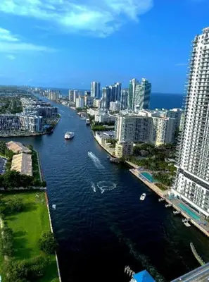 a view of a river in a city with buildings at Miami Beach 2BR with Pool & Ocean View in Hallandale Beach