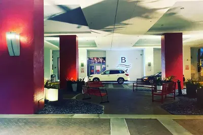 a car parked in a parking lot in a building at 2BR Luxury Stay, Pool, Beach & Mall in Hallandale Beach