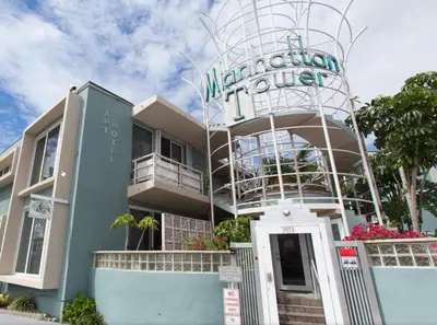 a building with a sign that reads marion motel at Manhattan Tower Apartment Hotel in Fort Lauderdale