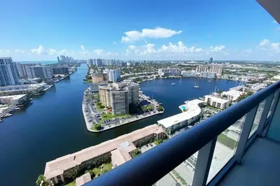 a view of a river from a balcony at Oceanview 2BR with Beach & Pool -Hallandale in Hallandale Beach