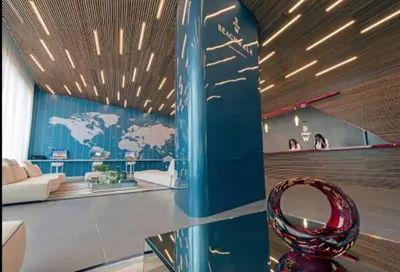 a living room with a glass table and a world mural at Seaside Retreat in Miami, Full Kitchen & Balcony Views -A in Hallandale Beach