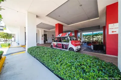 a food truck parked inside of a building at Chill Out in This Stylish 2-Full Bed BeachWalk Studio in Hallandale Beach
