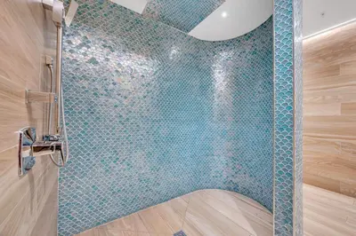 a bathroom with a shower with a glass wall at Modern Unit in Downtown Miami With Free Parking in Miami