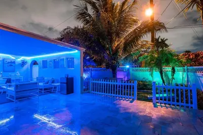 a villa with a pool at night at ~Villa Victoria Luxury! (Pool)~1 mile from beach in Fort Lauderdale