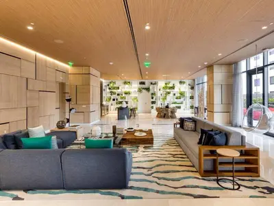 a large living room with couches and a rug at Gorgeous Upscale Condo in the Middle of Brickell in Miami