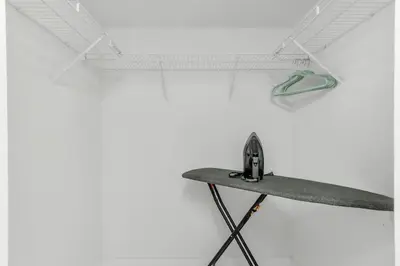 a plane on a table in a white room at Brickell Bay View Oasis with Pool Hot Tub and Gym in Miami