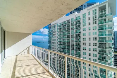 a balcony with a view of a tall building at Modern Sky Residence with Ocean and City Views in Miami